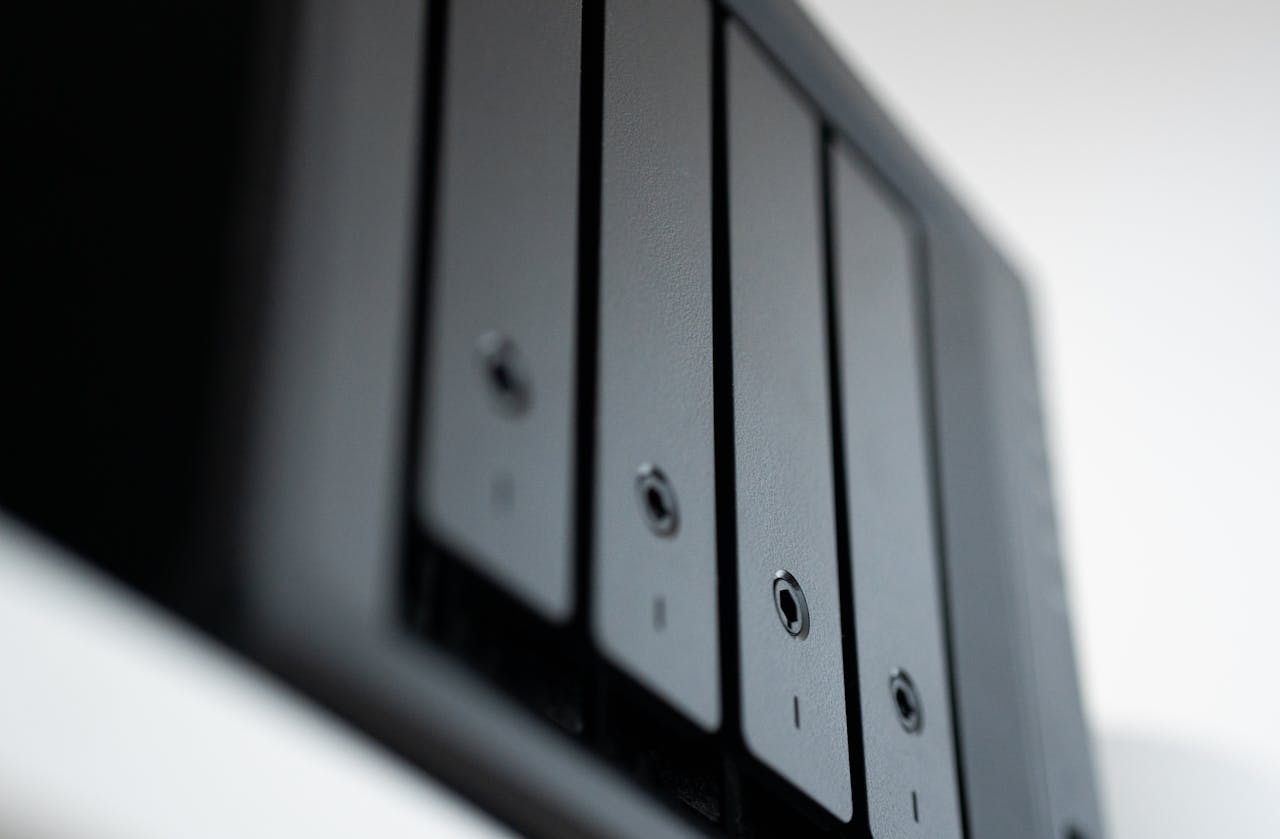 services-01 Detailed view of a black data storage unit highlighting modern technology and data management.