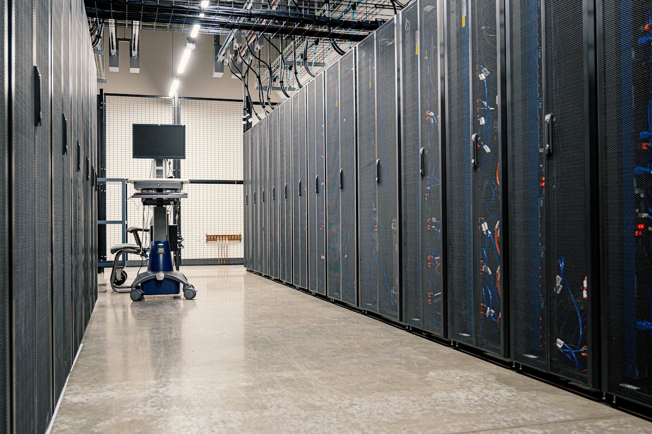 services-02 Modern data center corridor with server racks and computer equipment. Ideal for technology and IT concepts.